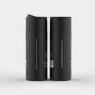 Side view of RINSE Daily men’s intimate wash 150ml bottles, showing eco-friendly and vegan-friendly labeling on matte black packaging